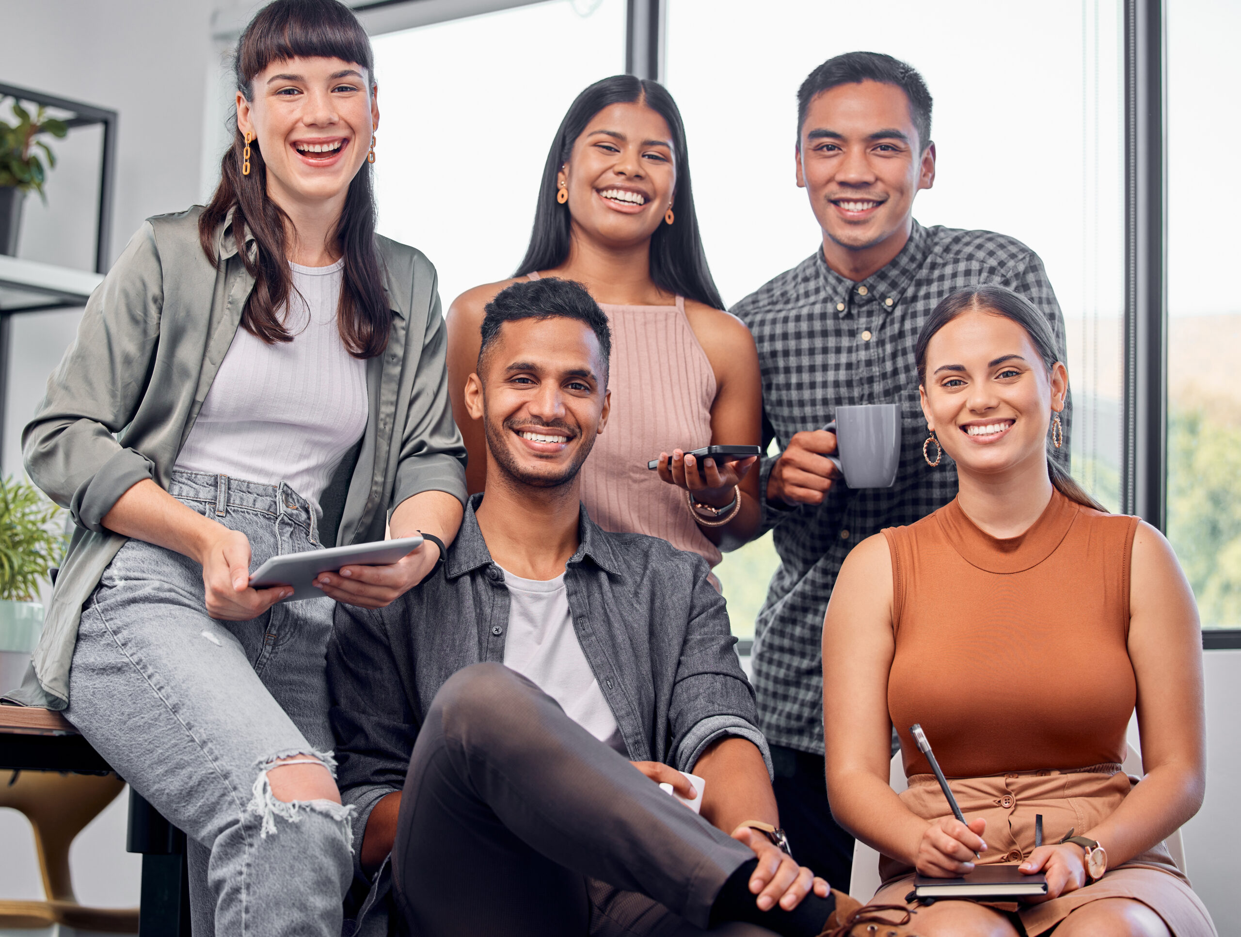 A group of young professionals at the office.